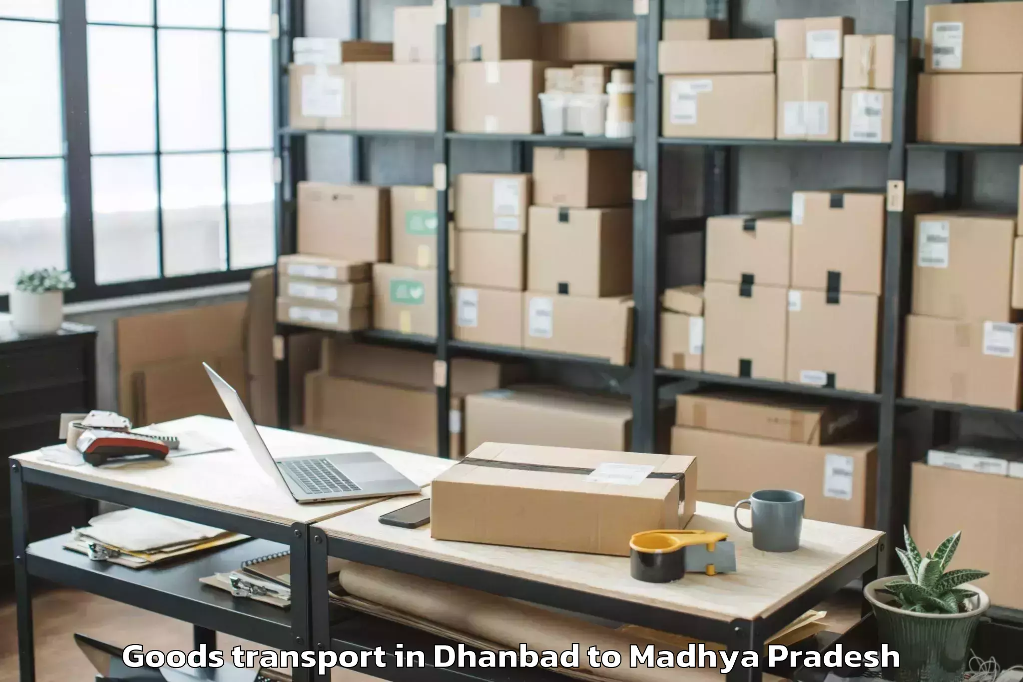 Book Dhanbad to Tarana Goods Transport